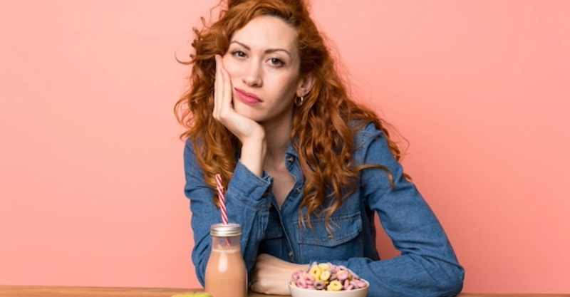 girl thinking what to eat after root canal