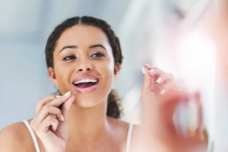 Flossing teeth
